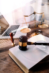 Business and lawyers discussing contract papers with brass scale on desk in office. Law, legal services, advice, justice and law concept picture with film grain effect - obrazy, fototapety, plakaty