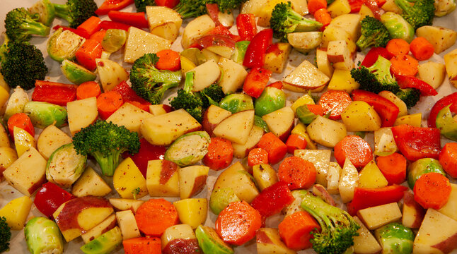 chopped mixed vegetables carrots potato broccoli Brussel sprouts  Bell pepper healthy meal vegetarian 
