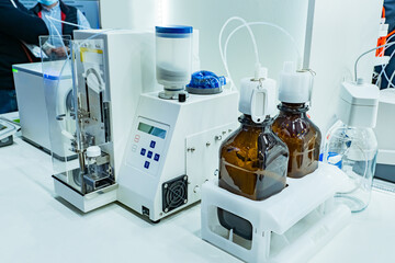 Equipment for titration in food laboratory. Food laboratory equipment. Automatic titrator during operation. Food analysis. Titration experiments. Checking protein in foods. Sale laboratory equipment