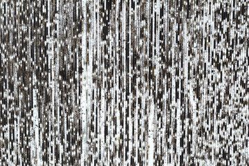 The surface of transparent plastic with dust and traces of rain drops on it as background, texture,...