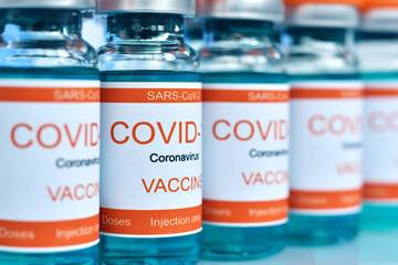 Glass ampoules with Covid-19 vaccine.