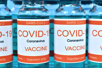 Covid-19 vaccine in glass bottles.