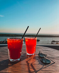 cocktails with sea view from hotel rooftop