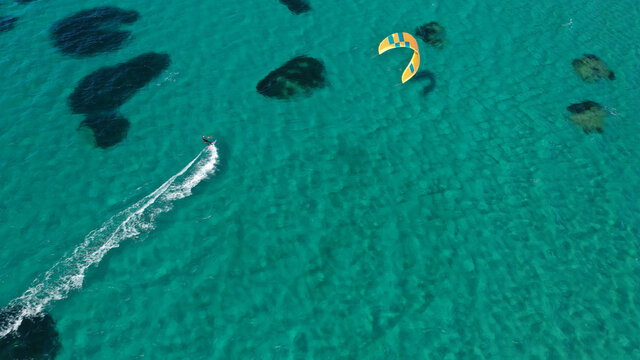 Aerial drone photo of kite surfer practise in tropical exotic island bay with emerald crystal clear sea