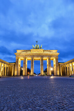 Berlin Brandenburger Tor Brandenburg Gate in Germany at night blue hour portrait format copyspace copy space