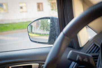 Steering wheel and mirror in the car.