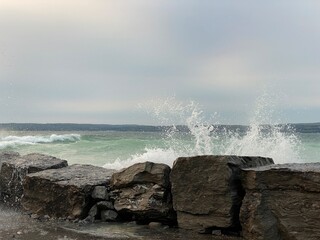 waves crashing on rocks