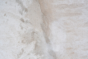 White and gray concrete wall is a decorative or textured surface. Can be used as a background or for design purposes