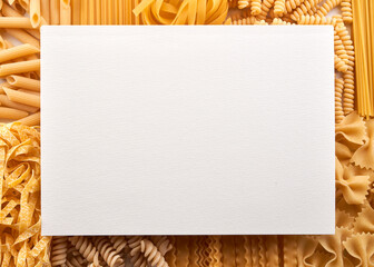 Assorted varieties of pasta wallpaper. Mix macaroni, spaghetti with blank space for text