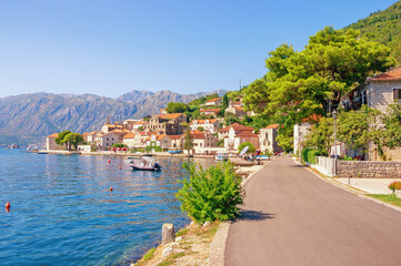 Balkan road trip. Beautiful Mediterranean landscape. Montenegro, Adriatic Sea. View of Kotor Bay and ancient town of Perast on sunny autumn day - obrazy, fototapety, plakaty