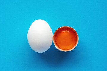 raw white chicken egg on background	
