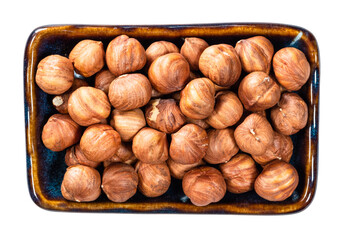 top view of shelled hazelnuts in bowl cutout
