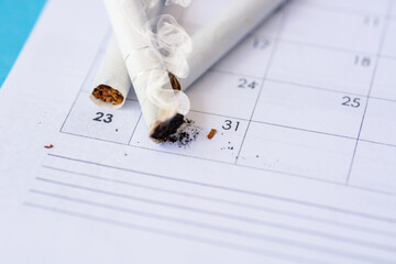 cigarettes in trash can, quit smoking - 31 may World No Tobacco Day infocard