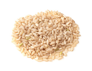 pile of polished brown rice closeup on white