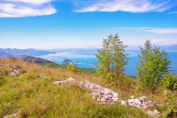 Beautiful sunny landscape in mountains, coast of lake. Montenegro. National Park Lake Skadar