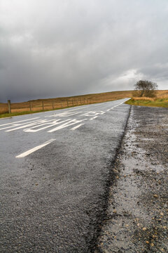 Wales road in open country. Exo triangle, the A543 road north of Pentrefoelas.
