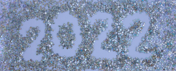 Happy New Year 2022 on a brilliant background of silver stars