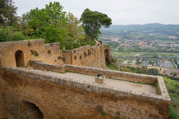 High stone walls of old medieval town of Orvieto in Umbria, Italy