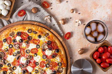 Pizza. The photo shows a part of the pizza. And also ingredients: tomatoes, mushrooms, seafood. Beautiful still life. Light tone, contrasting colors. View from above.