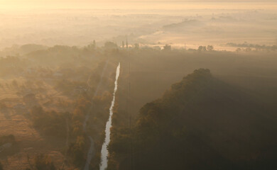 River above fog during sunrise from sky