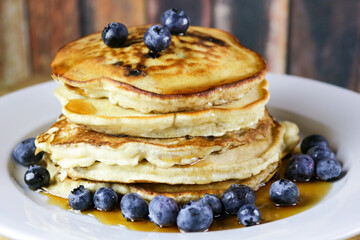 A Stack of Homemade Blueberry Pancakes with Real Maine Maple Syrup