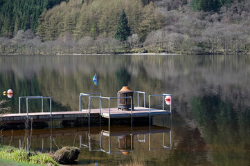 Pier on lake with BBQ at Loch Eck in Dunoon