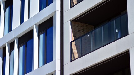 Details in modern white residential flat apartment building.  European architectural complex, downtown building.