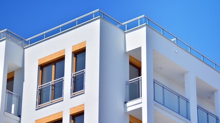 Details in modern white residential flat apartment building.  European architectural complex, downtown building.