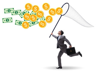 Businessman catching money with landing net