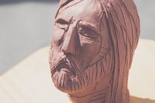Jesus Christ face clay sculpture