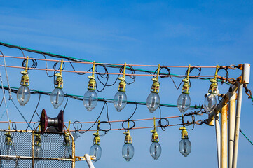 Lamps of a squid fishing gear on a fishing boat moored in the port of Mar del Plata