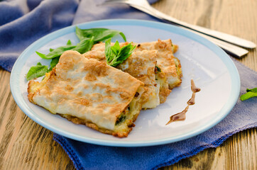 cottage cheese with spinach fried in pita bread