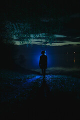 Silhouette of a girl at night.