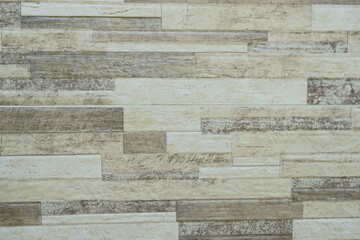 Beautiful tile texture. Brown and cream ceramics in nuances of alternating light and dark colors.