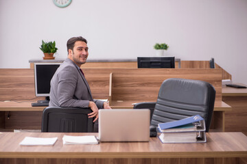 Young businessman employee working in the office