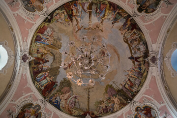 Obraz premium Tÿrol, Austria, October 2018 - beautiful view of a fresco at the ceiling of Heiliges Kreuz Church 