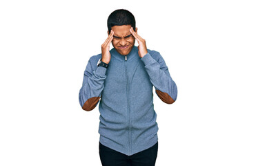 Young handsome hispanic man wearing casual sweatshirt with hand on head, headache because stress....