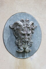 Sculpture of a Man in the Botanical Garden