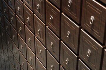 retro wooden drawers in traditional Chinese medicine pharmacy. TCM concept