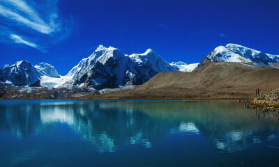 Naklejka premium Gurudongmar Lake, Sikkim, India and it's way from Lachen, North Sikkim. A holy lake never fully freezes. It is said that Goutam Buddha drinks water from this lake.