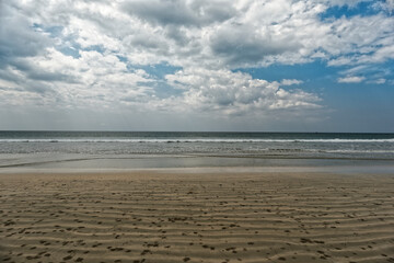 Emply beach tropical ocean. Cloudy Sky and ocean from distant