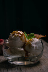 cream ice cream with dulce de leche caramel and wafer