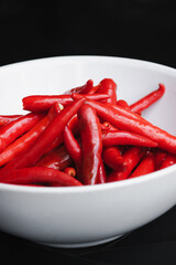 Bright red chili in a cup
