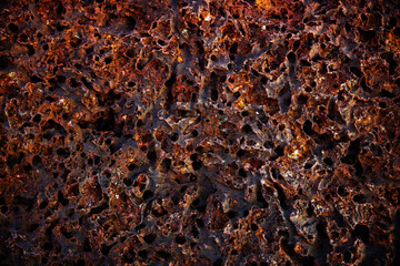 Porous Rock Sandstone Texture Background. Surface of Stone by the Seaside. Naturally Occurring Solid Mass