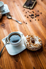 White donut with chocolate sprinkle