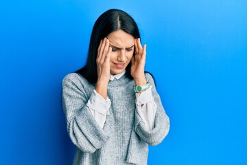 Young hispanic woman wearing casual clothes with hand on head, headache because stress. suffering migraine.