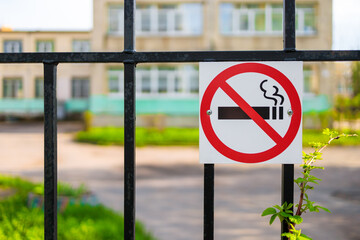 a warning sign that smoking is prohibited on the territory