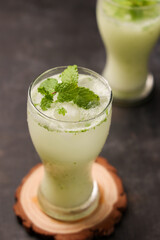 Spiced buttermilk , chaas , chaach , moru , sambharam , curd, lassi , yogurt, cool refreshing drink for hot summer in glass , Kerala, India. Flavored Indian buttermilk.	