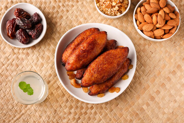 Unnakkaya , banana rolls,  popular Kerala snack for Ramadan Kareem, India, sri Lanka . Traditional Iftar food dish Malabar Muslim feast. Holy month of Ramadan. tea time snack