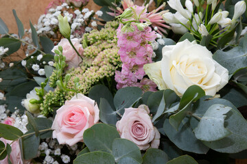 Fototapeta na wymiar wedding bride pink green white closeup on decoration bouquet flowers in marriage day